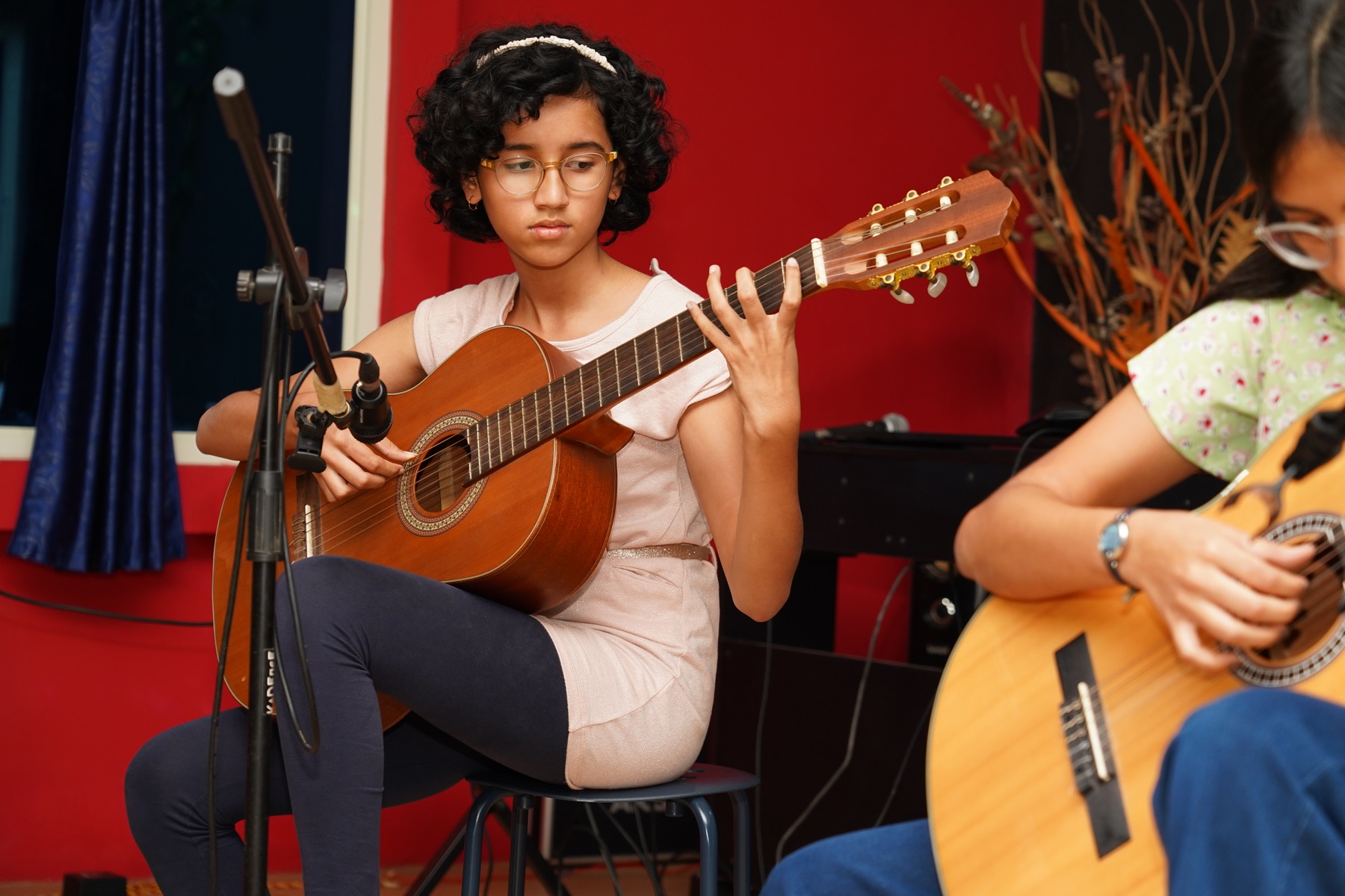 Classical guitar students performing together at SARA Music School